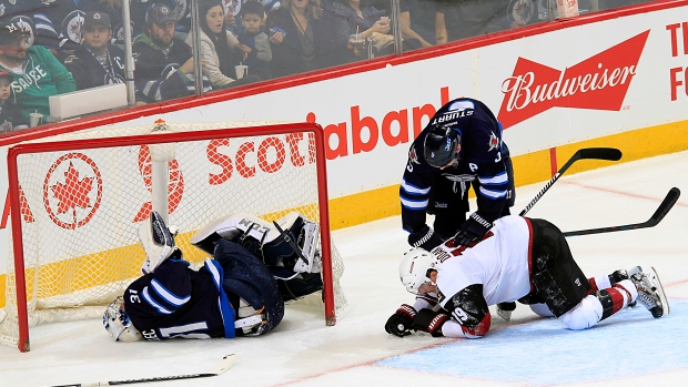 Ondrej Pavelec goes down injured