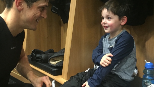 Vinny Lecavalier and son Gabriel, 4, in the Flyers’ locker room after practice