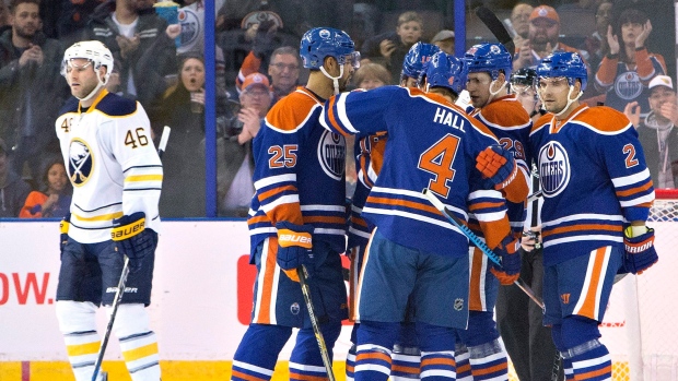 Taylor Hall and Oilers celebrate a goal.