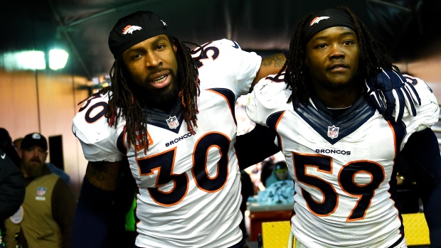 David Bruton Jr. helped by Danny Trevathan