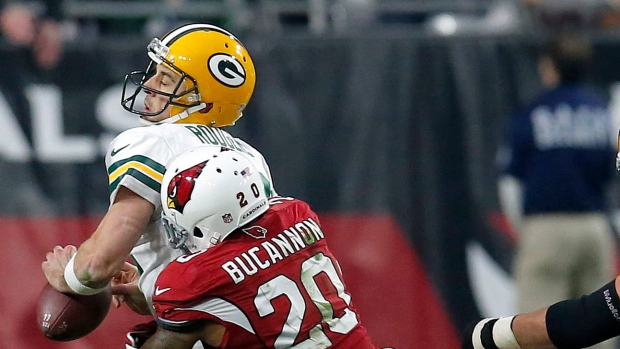 Aaron Rodgers and Deone Bucannon 