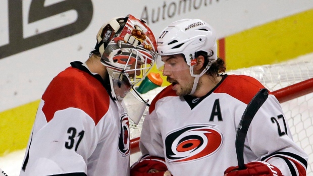 Eddie Lack and Justin Faulk, The Canadian Press Eddie Lack and Justin Faulk