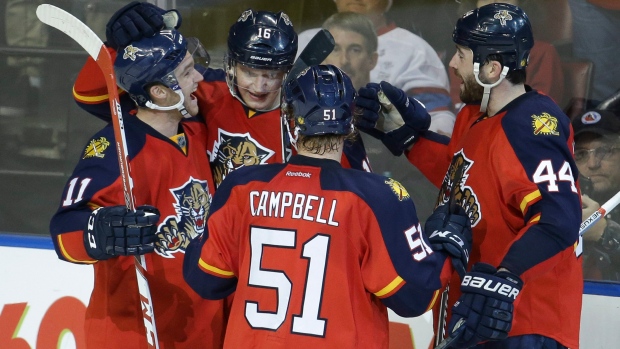 Panthers players celebrate, The Canadian Press Panthers players celebrate
