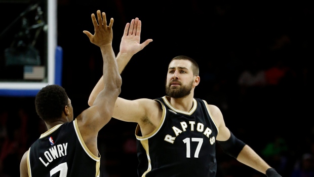 Kyle Lowry and Jonas Valanciunas, The Canadian Press Kyle Lowry and Jonas Valanciunas