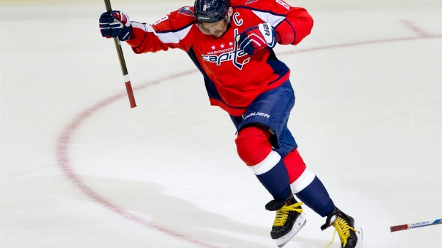 Ovechkin passes Fedorov for Russian scoring record in NHL in Capitals win  over Canucks