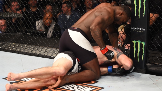 Anthony Johnson punches Ryan Bader, Josh Hedges/Zuffa LLC/Zuffa LLC via Getty Images Anthony Johnson punches Ryan Bader