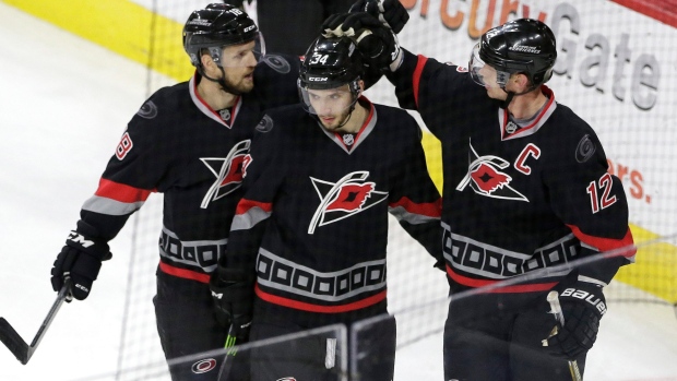 Eric staal deals hurricanes jersey