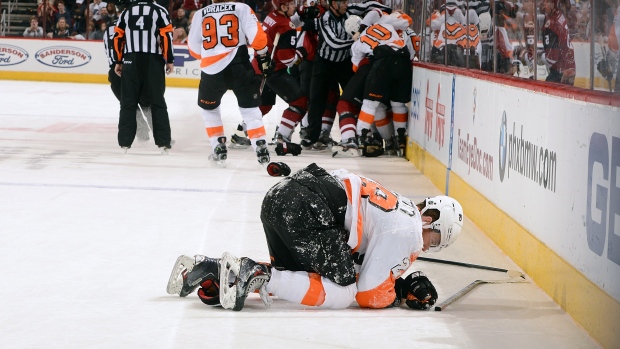 Claude Giroux prone after hit from Martin Hanzal, Norm Hall/National Hockey League/Getty Images Claude Giroux prone after hit from Martin Hanzal