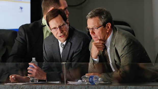David Poile, left, and Paul Fenton, John Russell/National Hockey League/Getty Images David Poile, left, and Paul Fenton