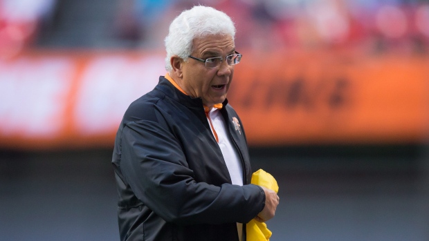 Wally Buono with a challenge flag