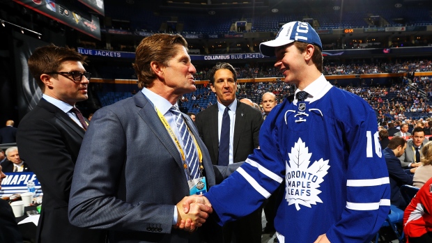 Kyle Dubas, Mike Babcock and Brendan Shanahan welcome Joseph Woll