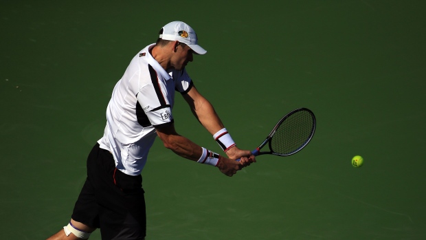 John Isner, Vaughn Ridley/Getty Images John Isner