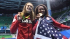 Penny Oleksiak and Simone Manuel celebrate gold