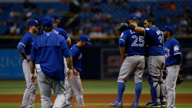 Marco Estrada waits on the mound for John Gibbons