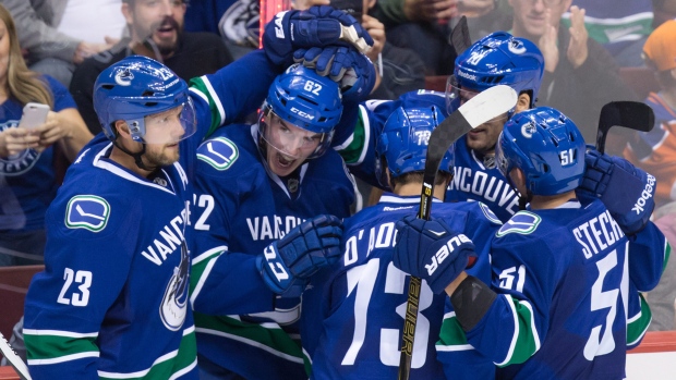 Canucks celebrate, The Canadian Press Canucks celebrate