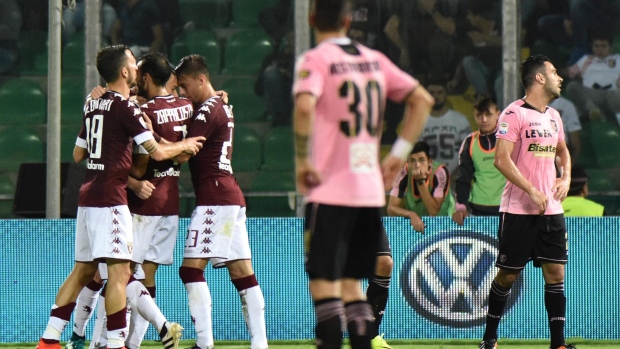 Torino players celebrate, The Canadian Press Torino players celebrate