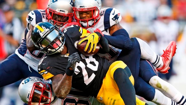 Patriots tackle Bell, The Canadian Press Patriots tackle Bell