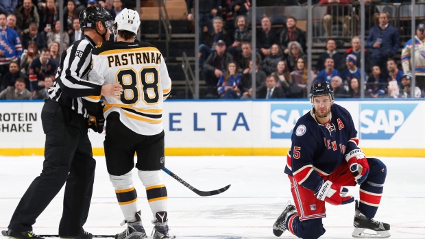 David Pastrnak and Dan Girardi, Jared Silber/National Hockey League/Getty Images David Pastrnak and Dan Girardi
