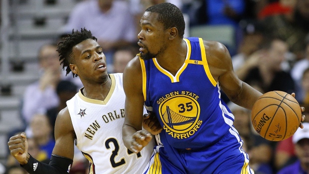 Kevin Durant and Buddy Hield, Jonathan Bachman/Getty Images Kevin Durant and Buddy Hield