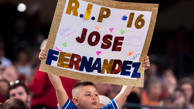 Fan holds sign for Jose Fernandez