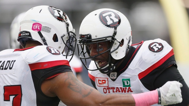 Redblacks celebrate, The Canadian Press Redblacks celebrate