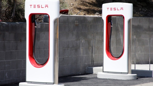 Tesla Motors charging stations neat Truckee, Calif. , (Margaret Moran/Sierra Sun via AP, File) Tesla Motors charging stations neat Truckee, Calif.