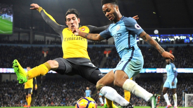 Arsenal's Hector Bellerin and Manchester City's Raheem Sterling