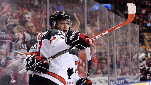 Dylan Strome celebrates