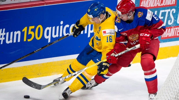 Sweden's Carl Grundstrom and Russia's Sergei Zborovski