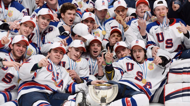 Team USA celebrates, The Canadian Press Team USA celebrates