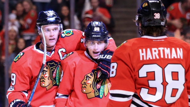 Jonathan Toews, Patrick Kane and Ryan Hartman