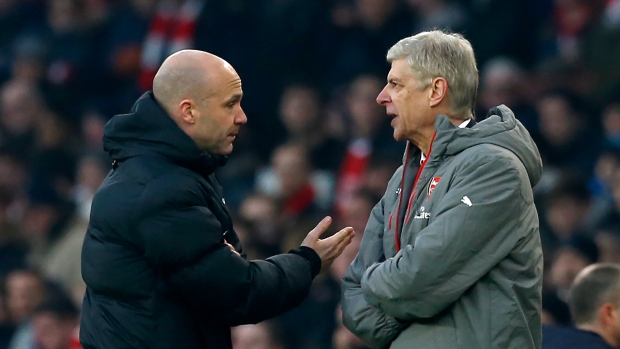 Anthony Taylor and Arsene Wenger