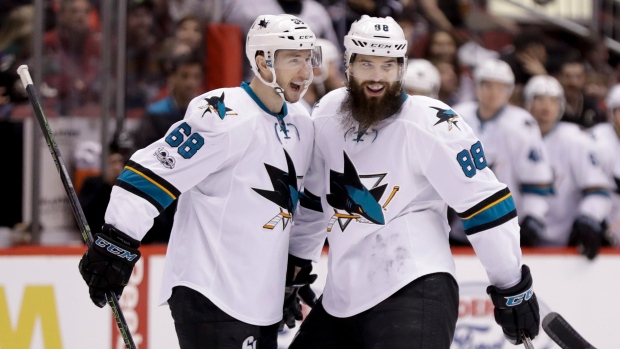 Karlsson, Burns celebrate, The Canadian Press Karlsson, Burns celebrate