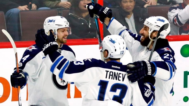 Winnipeg Jets celebrate, The Canadian Press Winnipeg Jets celebrate
