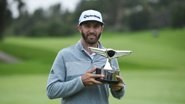 Dustin Johnson celebrates Genesis Open win