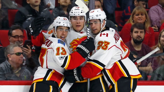 Micheal Ferland Johnny Gaudreau Sean Monahan , Raleigh News & Observer/Tribune News Service/Getty Images Micheal Ferland Johnny Gaudreau Sean Monahan