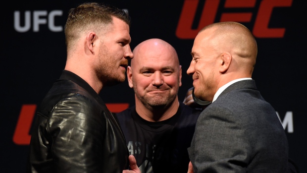 Michael Bisping Georges St-Pierre, Josh Hedges/Zuffa LLC/UFC/Getty Images Michael Bisping Georges St-Pierre
