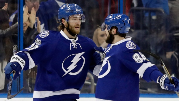 Hedman, Kucherov celebrate, The Canadian Press Hedman, Kucherov celebrate