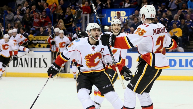 Flames celebrate, The Canadian Press Flames celebrate