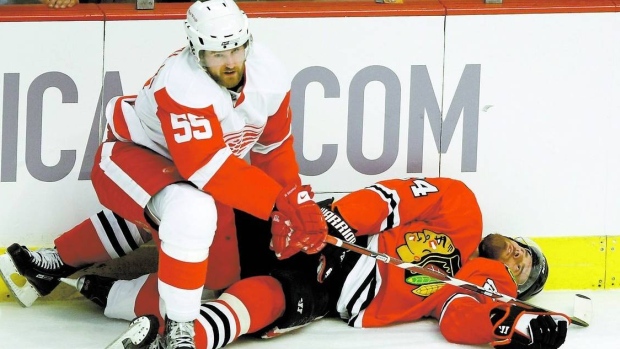 Niklas Kronwall hits Martin Havlat