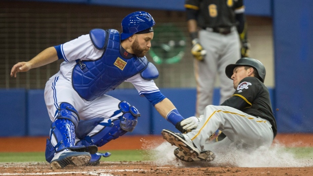 Jays, Pirates settle for tie in Montreal 
