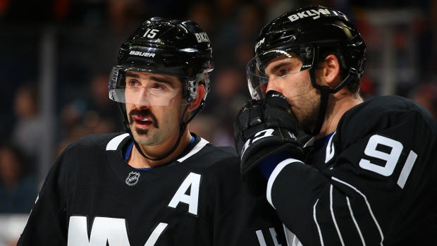 Clutterbuck and Tavares, Mike Stobe/National Hockey League/Getty Images Clutterbuck and Tavares