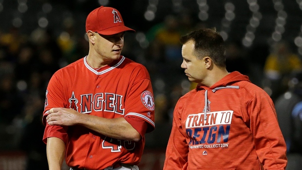 Garrett Richards and trainer