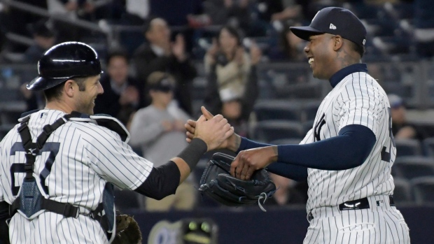 Montgomery gets first win, Yanks beat White Sox for eighth in row