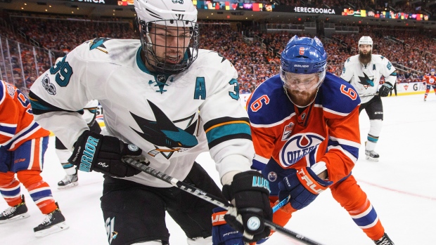Logan Couture and Adam Larsson, The Canadian Press Logan Couture and Adam Larsson