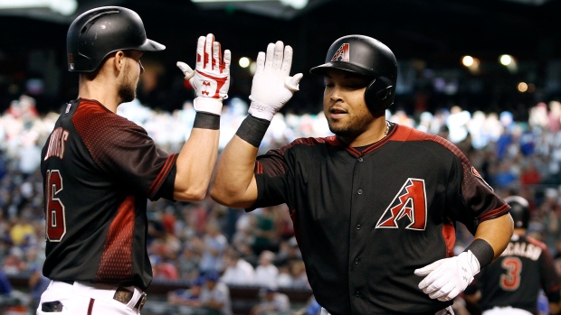 Yasmany Tomas and Chris Owings, The Canadian Press Yasmany Tomas and Chris Owings