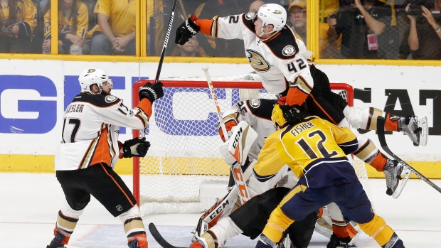 Manson collides with Fisher, The Canadian Press Manson collides with Fisher
