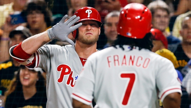 Michael Saunders and Maikel Franco