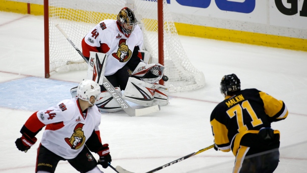 Craig Anderson and Evgeni Malkin, The Canadian Press Craig Anderson and Evgeni Malkin