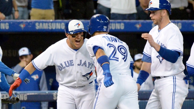 Troy Tulowitzki, Justin Smoak and Devon Travis